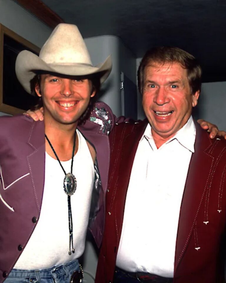 In 1981, Buck Owens began wandering through the offices on the Bakersfield block that carried his name. The studios were still working. His radio stations were still broadcasting. People had desks, calls and deadlines. Buck would sit with them for a while, then move to another room. Two years earlier, he had stopped recording. In 1980, he stopped touring. After decades of airports and late shows, he had expected to enjoy the freedom. He played golf, then tennis, then more golf. The empty hours kept coming. Buck later spoke plainly about that period: he had grown bored and deeply depressed. His wife Jennifer could see that retirement was wearing on him. At the offices, he sensed that the people around him could see it too. Owning a busy business was different from having work that required him to get up and meet a particular day. Late in 1985, he noticed a small advertisement seeking an investment partner for a local publication. Buck bought 51 percent of the business, then purchased the remaining 49 percent the following month. He turned the monthly publication into a weekly shopper delivered around Bakersfield. There was no stage in it for him. A shopper had to be filled, printed and sent out again whether its owner felt inspired or not. Buck took to the work with an energy that surprised him. In a 1987 interview, he called the publishing venture a lifesaver; by then, he said, the weekly was going to 110,000 homes. The familiar account of Buck’s quieter years usually runs from the loss of Don Rich to his eventual return alongside Dwight Yoakam. Both belong to his story. So do the years between them, when a man who had spent much of his life making records discovered that golf could not organize a week. By the time another generation was ready to hear Buck Owens sing again, Bakersfield households had already been receiving something from him every seven days.
