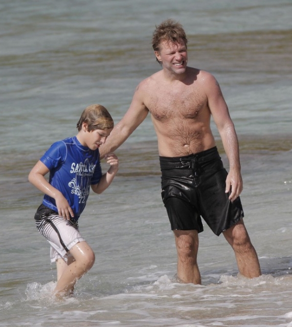 Rock Legend Spotted Enjoying a Quiet Beach Day With a Young Companion!: Can You Recognize Him?