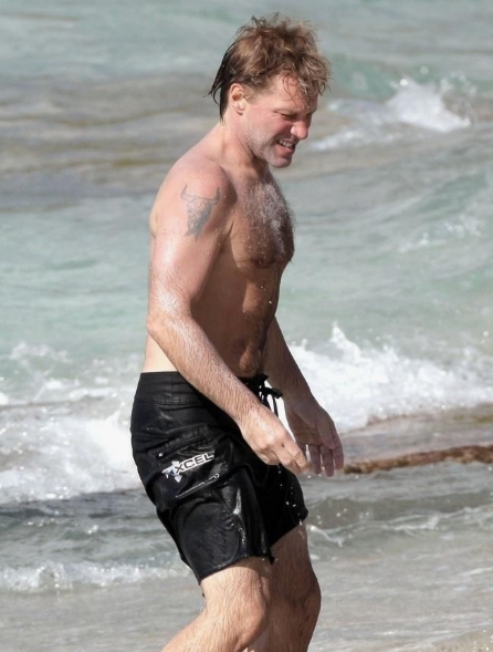 Rock Legend Spotted Enjoying a Quiet Beach Day With a Young Companion!: Can You Recognize Him?