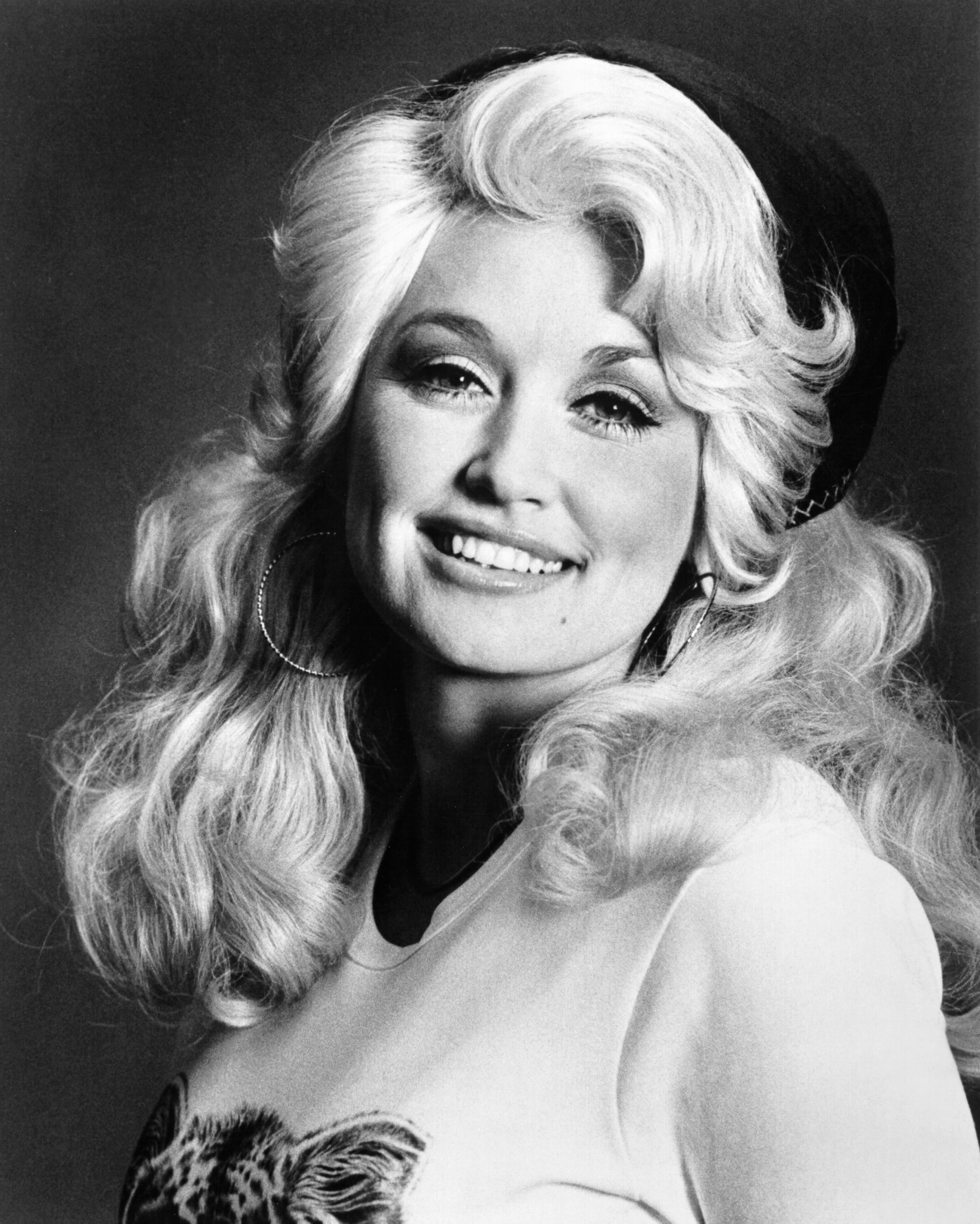 The Real Reason Dolly Parton Always Wore Her Signature Wigs