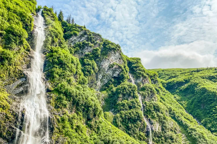 This 110-mile Train Route Is One of North America’s Most Scenic—Climbing Past Waterfalls, Mountains, and Alpine Lakes